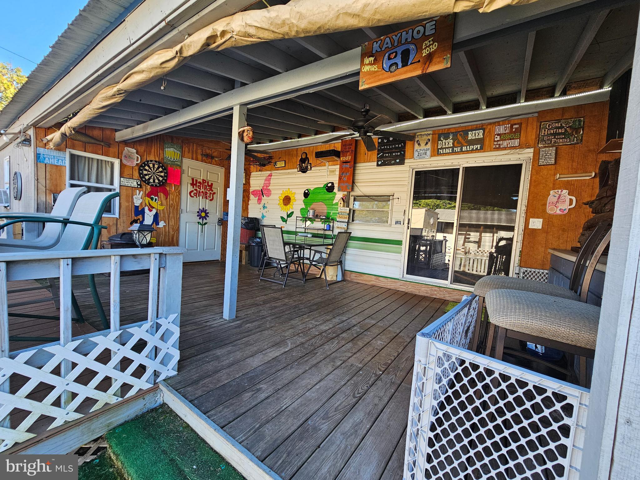 a view of a chairs and table in the patio