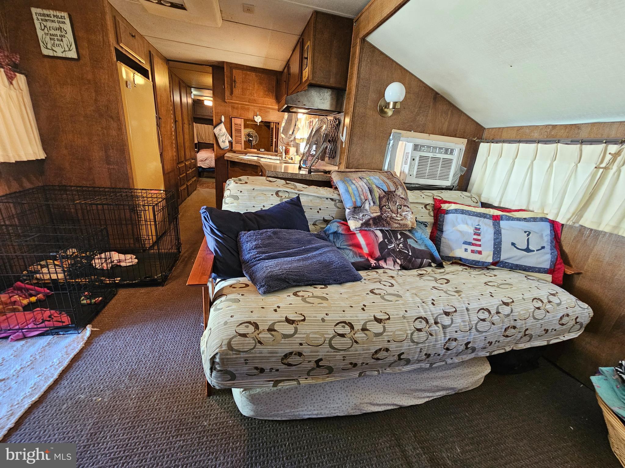 7 Poison Oak Falling Waters, WV 25419 - Photo 18 of 38 a bed sitting in a bedroom next to a window