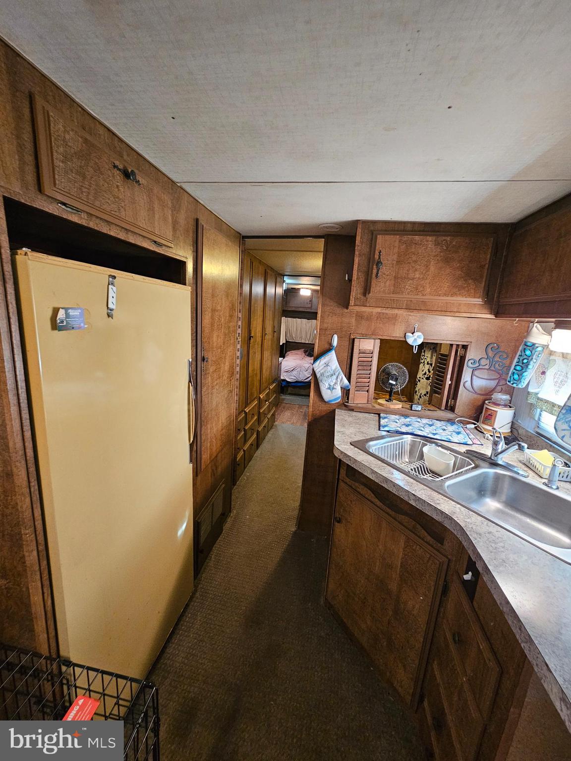 7 Poison Oak Falling Waters, WV 25419 - Photo 21 of 38 a kitchen with stainless steel appliances granite countertop a refrigerator and a sink