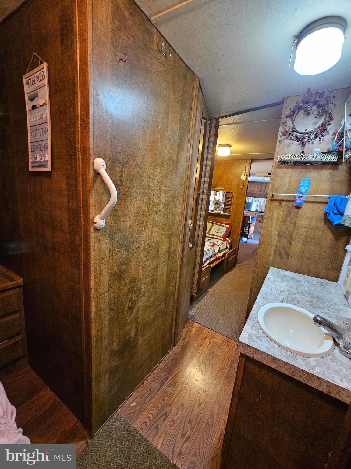 7 Poison Oak Falling Waters, WV 25419 - Photo 27 of 38 a bathroom with a sink and a mirror