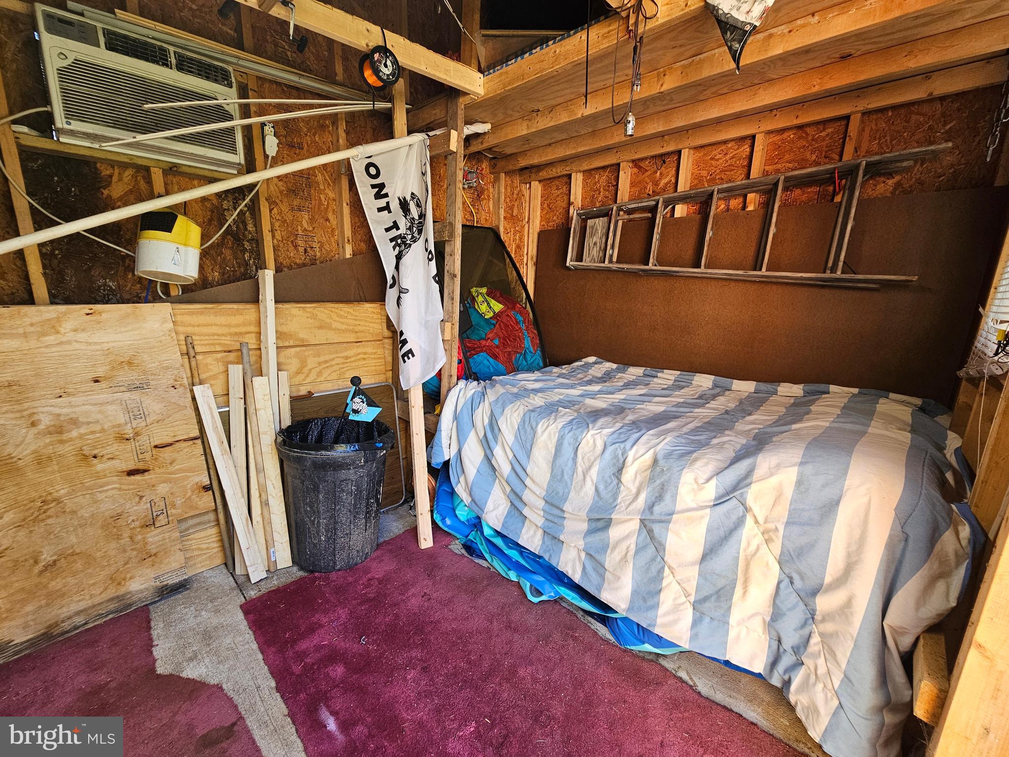 6 And 7 Poison Oak Falling Waters, WV 25419 - Photo 31 of 44 a bed sitting in a bedroom next to a window