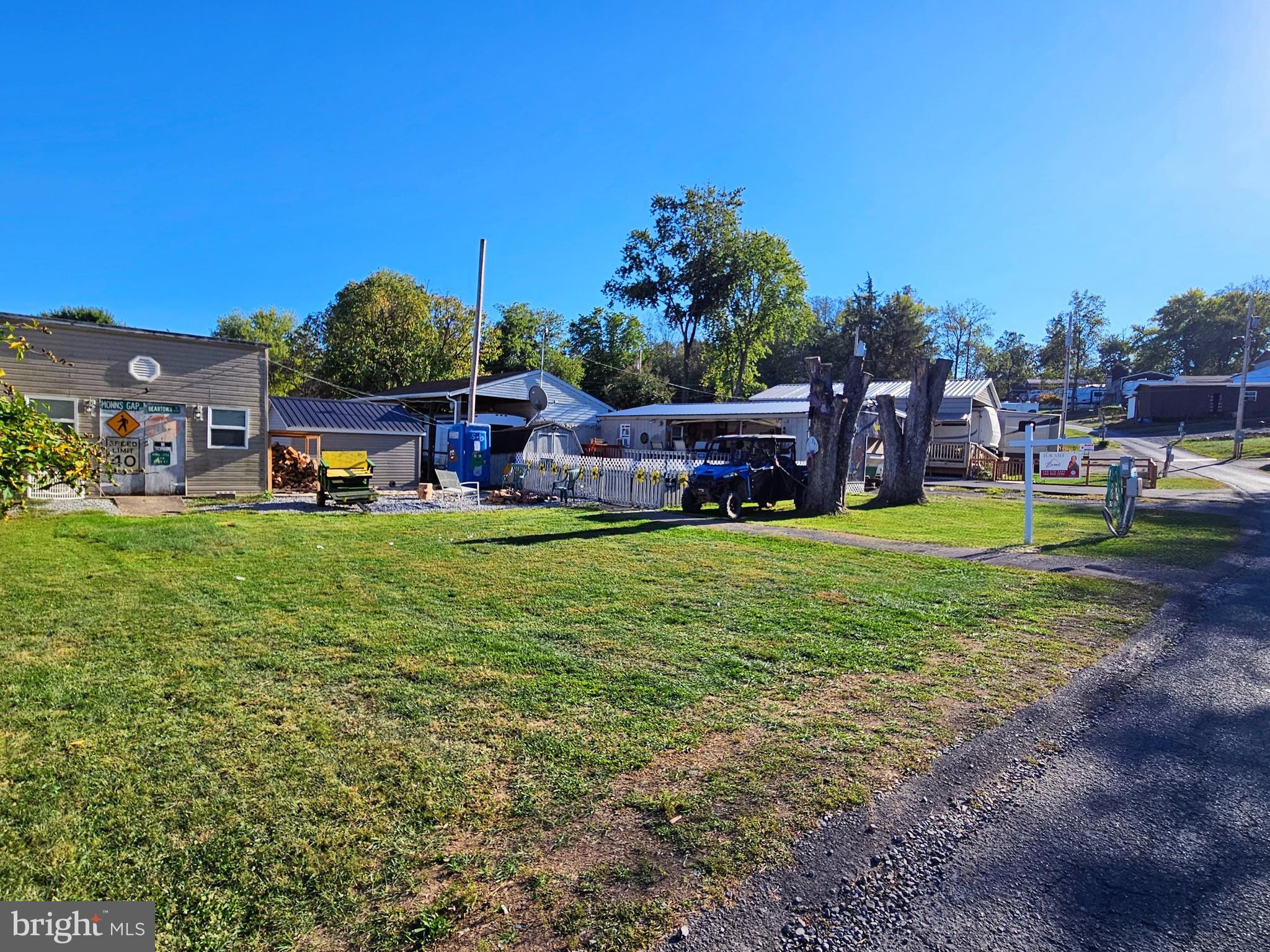 6 And 7 Poison Oak Falling Waters, WV 25419 - Photo 34 of 44 a view of a house with a yard porch and sitting area