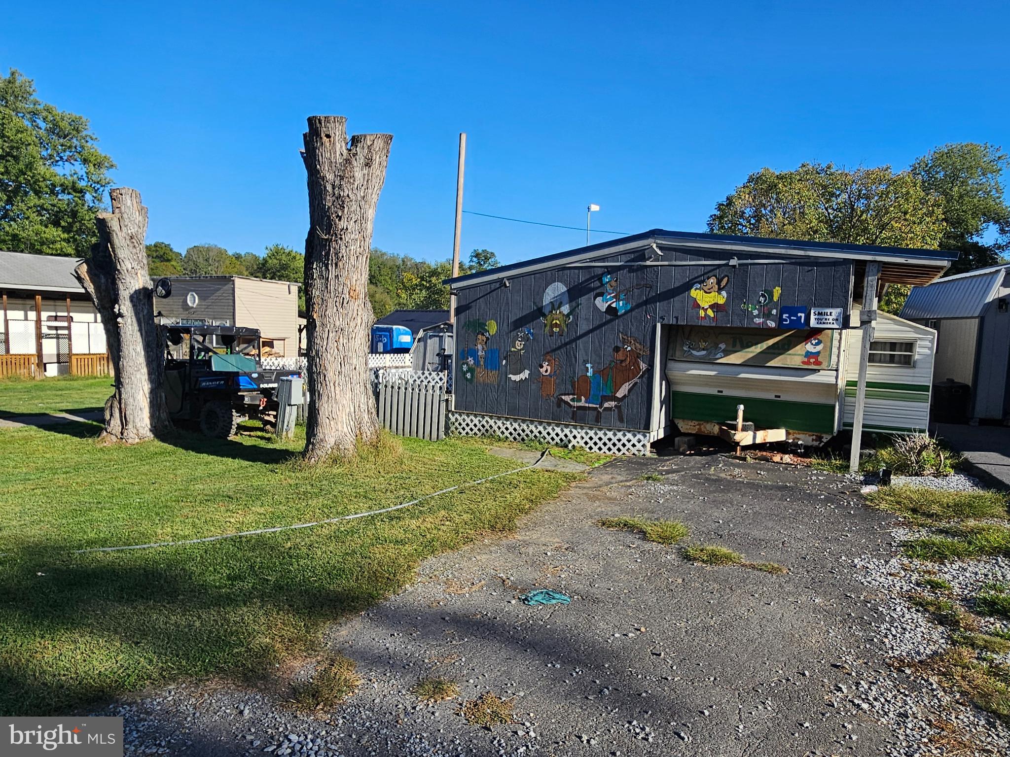 6 And 7 Poison Oak Falling Waters, WV 25419 - Photo 6 of 44 a view of a car park in front of the house