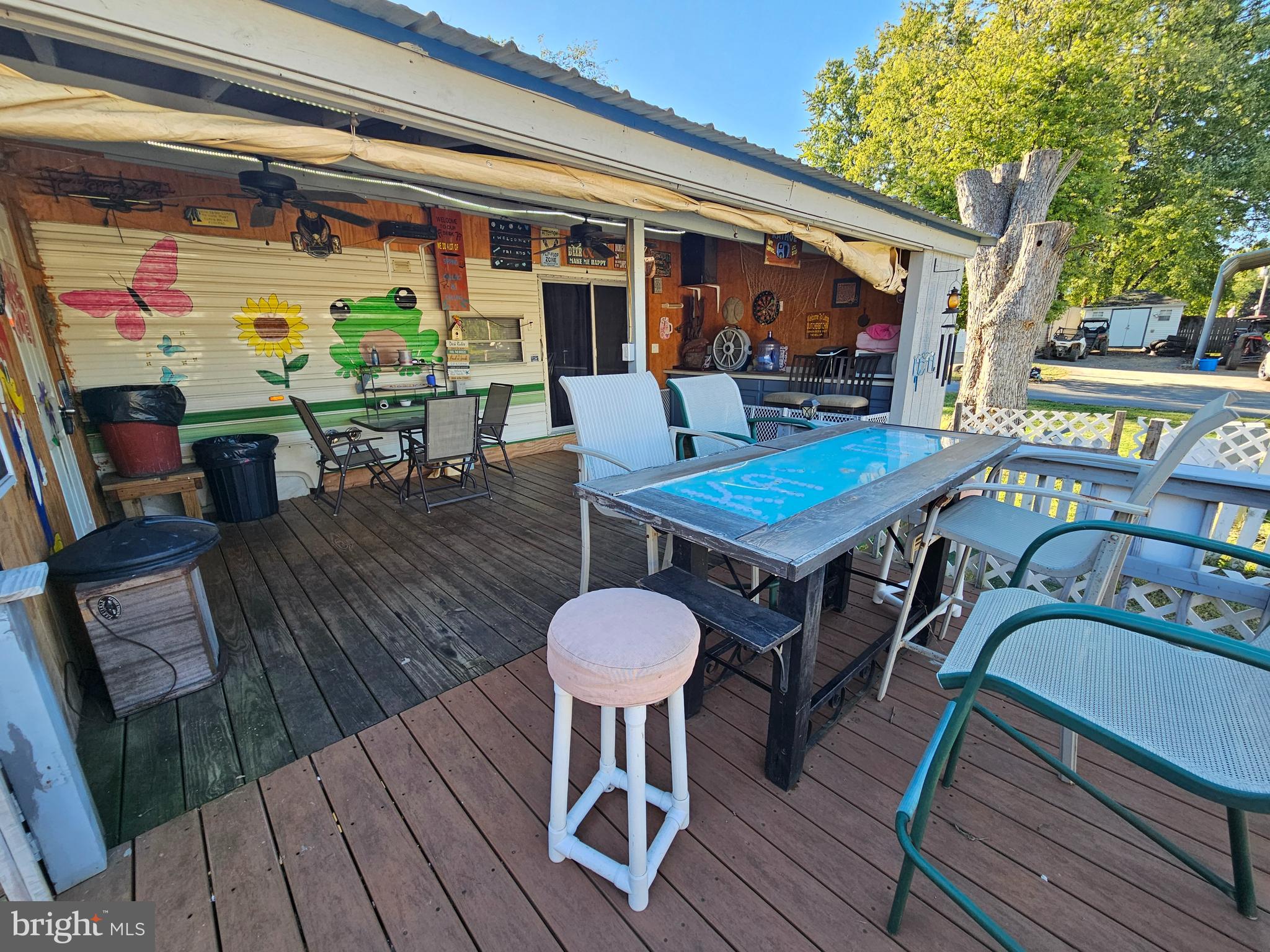7 Poison Oak Falling Waters, WV 25419 - Photo 10 of 38 a view of a chairs and table in patio with a barbeque