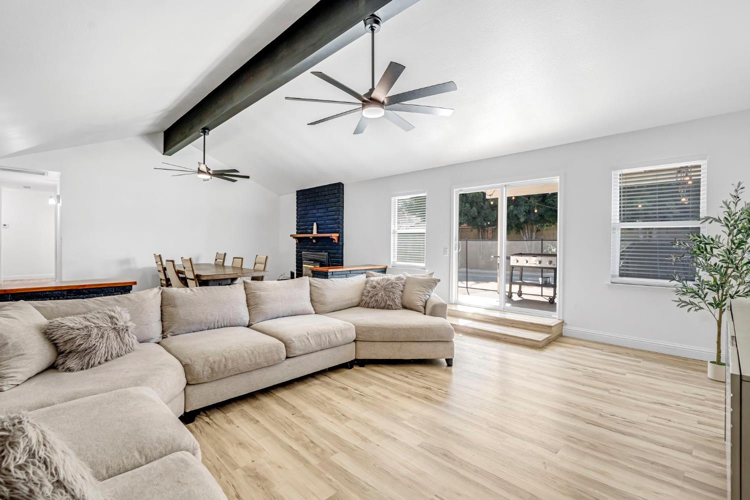 2428 West 3rd Street Madera, CA 93637 - Photo 12 of 39 a living room with furniture and a large window