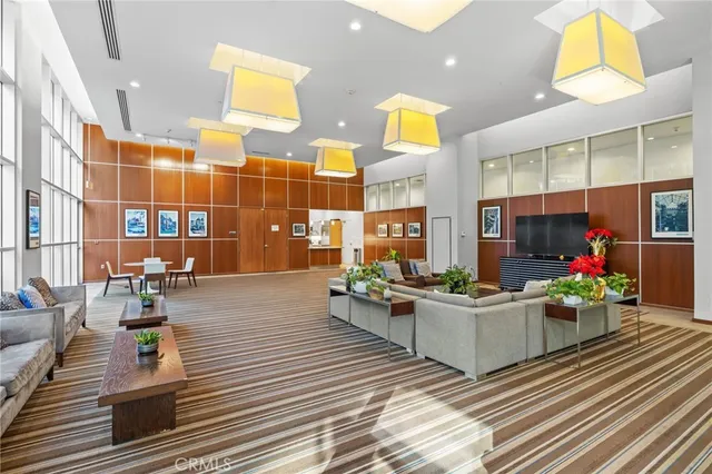 a kitchen with a stove a refrigerator and a sink