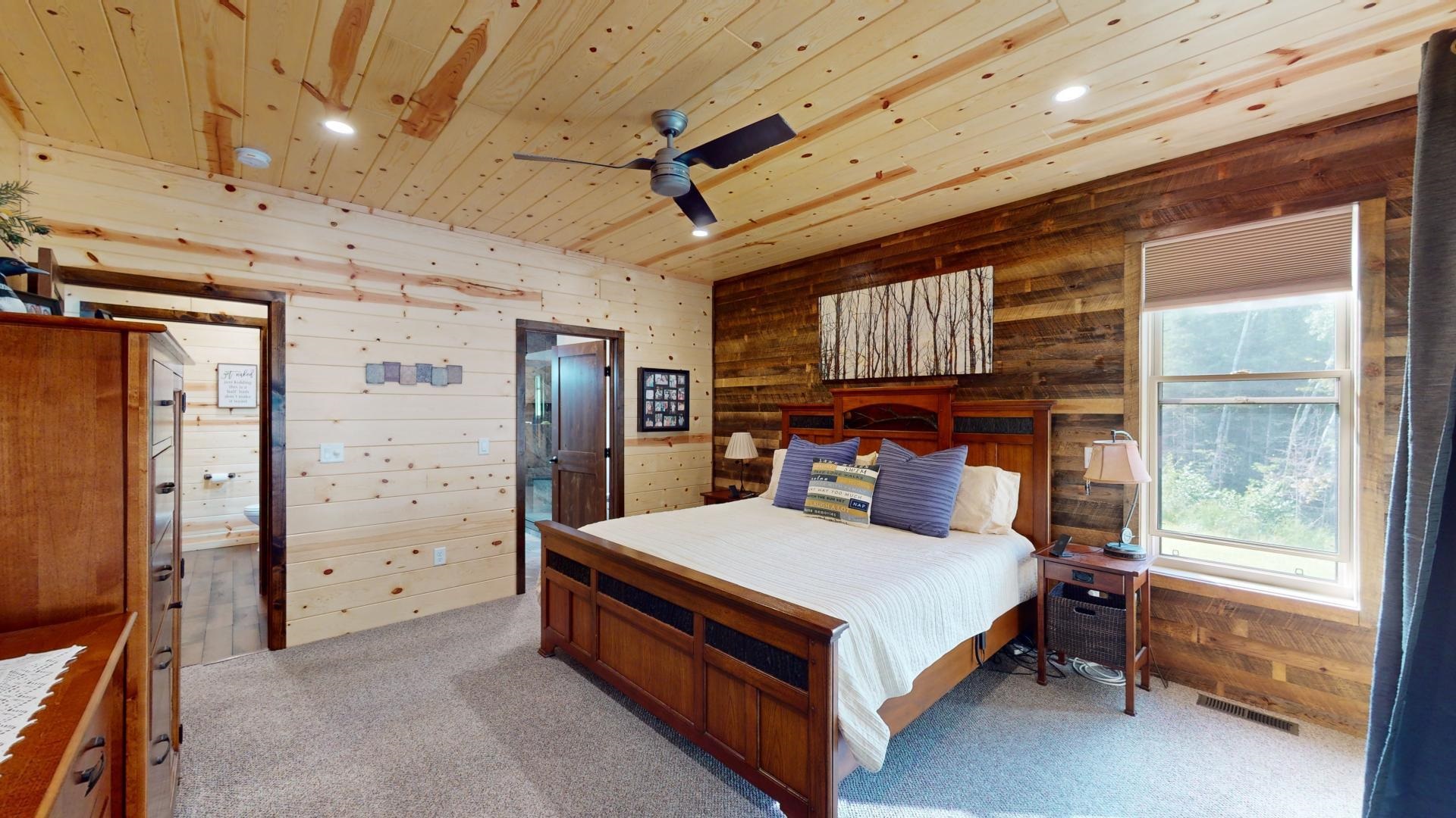 7523 Nelson Road Crane Lake, MN 55725 - Photo 19 of 50 Bedroom with carpet flooring, visible vents, wooden walls, recessed lighting, and wood ceiling