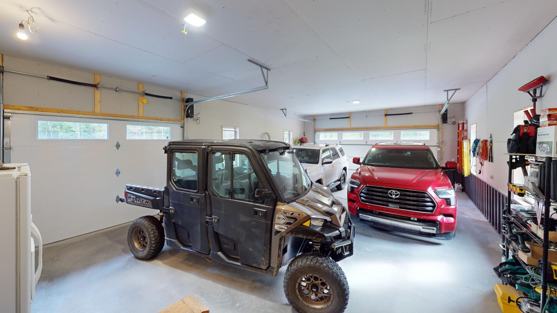 7523 Nelson Road Crane Lake, MN 55725 - Photo 26 of 50 Garage with refrigerator