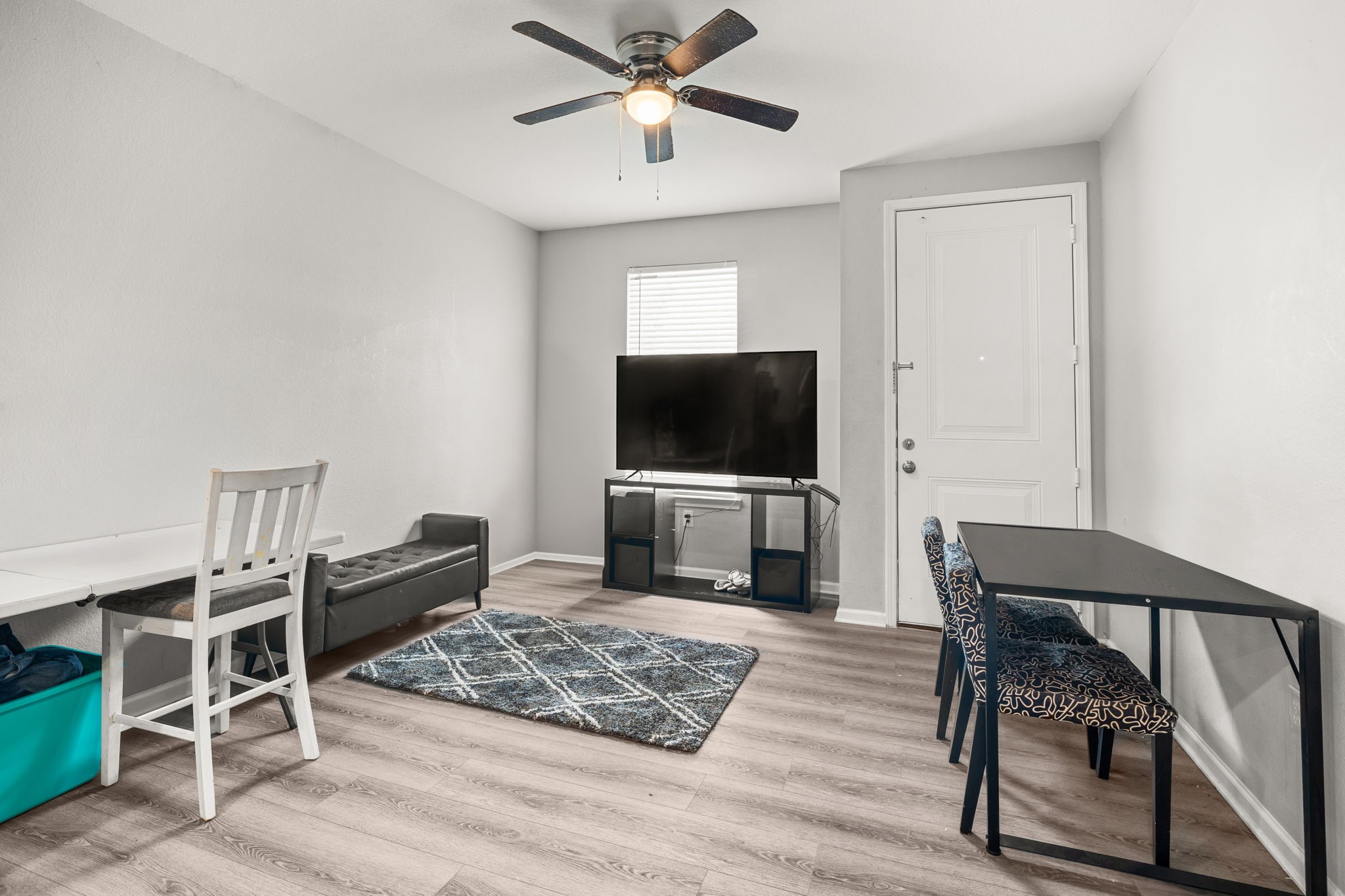 8534 Woodlyn Road Houston, TX 77028 - Photo 8 of 25 a living room with furniture and a flat screen tv