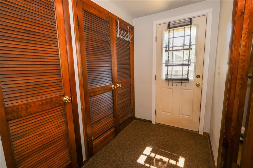103 Whitestown Road Lyndora, PA 16045 - Photo 13 of 28 a view of hallway with a chair
