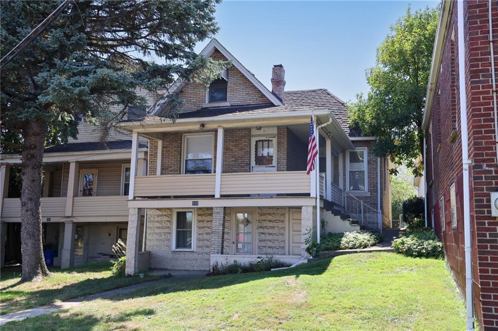 103 Whitestown Road Lyndora, PA 16045 - Photo 4 of 28 a front view of a house with a yard