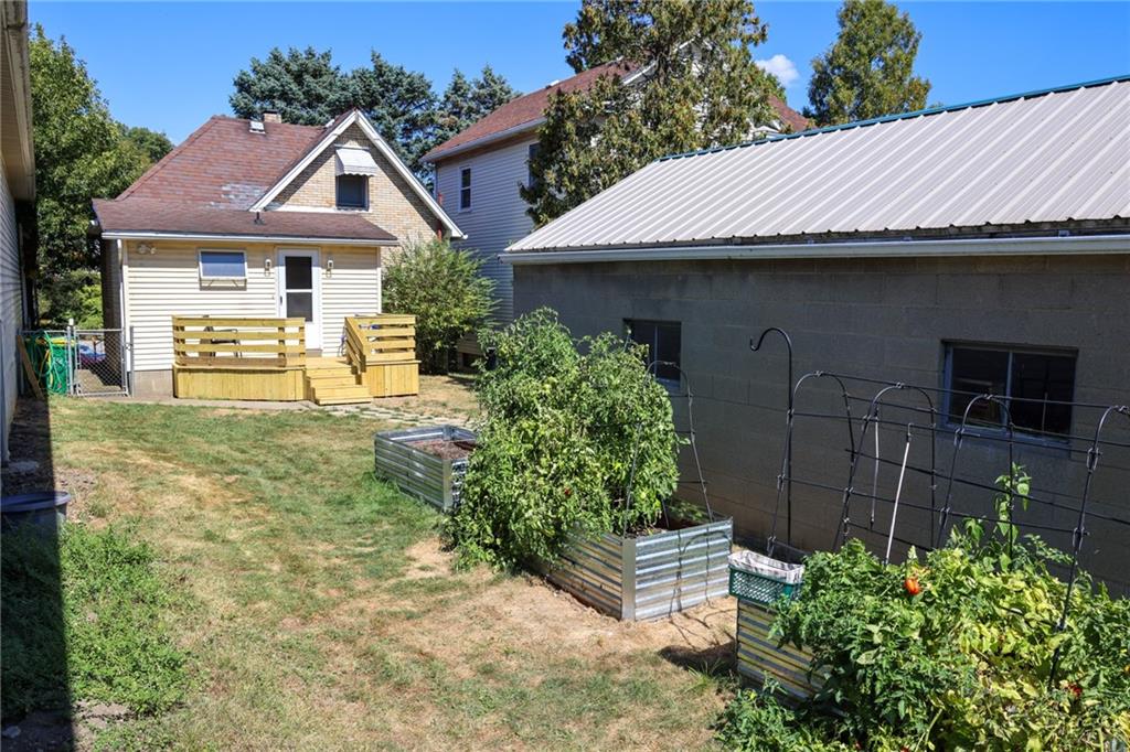 103 Whitestown Road Lyndora, PA 16045 - Photo 10 of 28 a front view of a house with garden