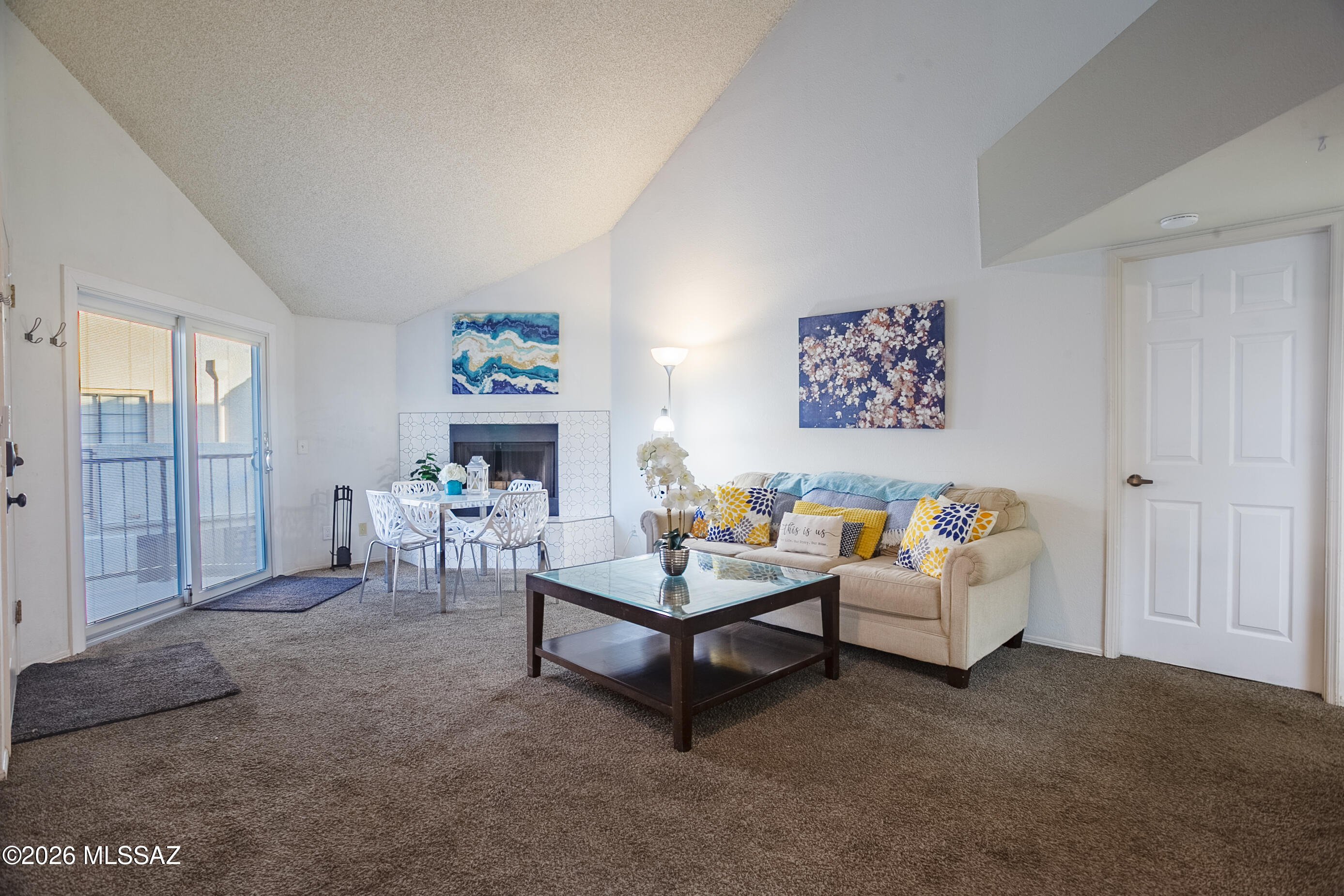 1200 East River Road, Unit B27 Tucson, AZ 85718 - Photo 9 of 40 a living room with furniture