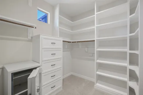 a view of an empty walk in closet