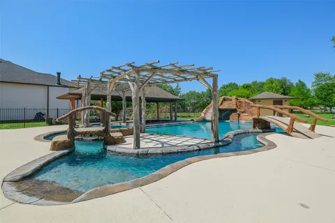 a view of a porch with wooden floor