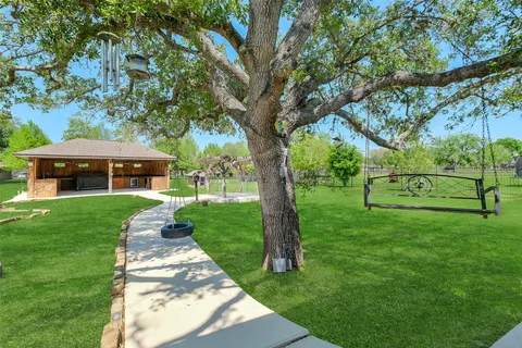 a view of a house with swimming pool