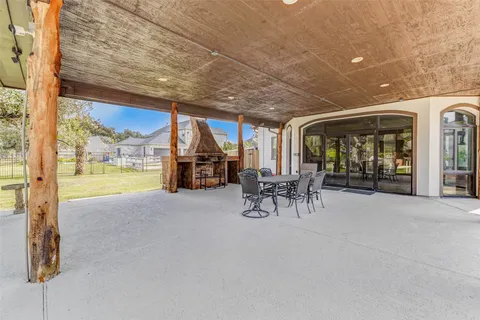a front view of a house with a big yard