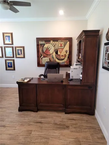 a view of furniture and wooden floor