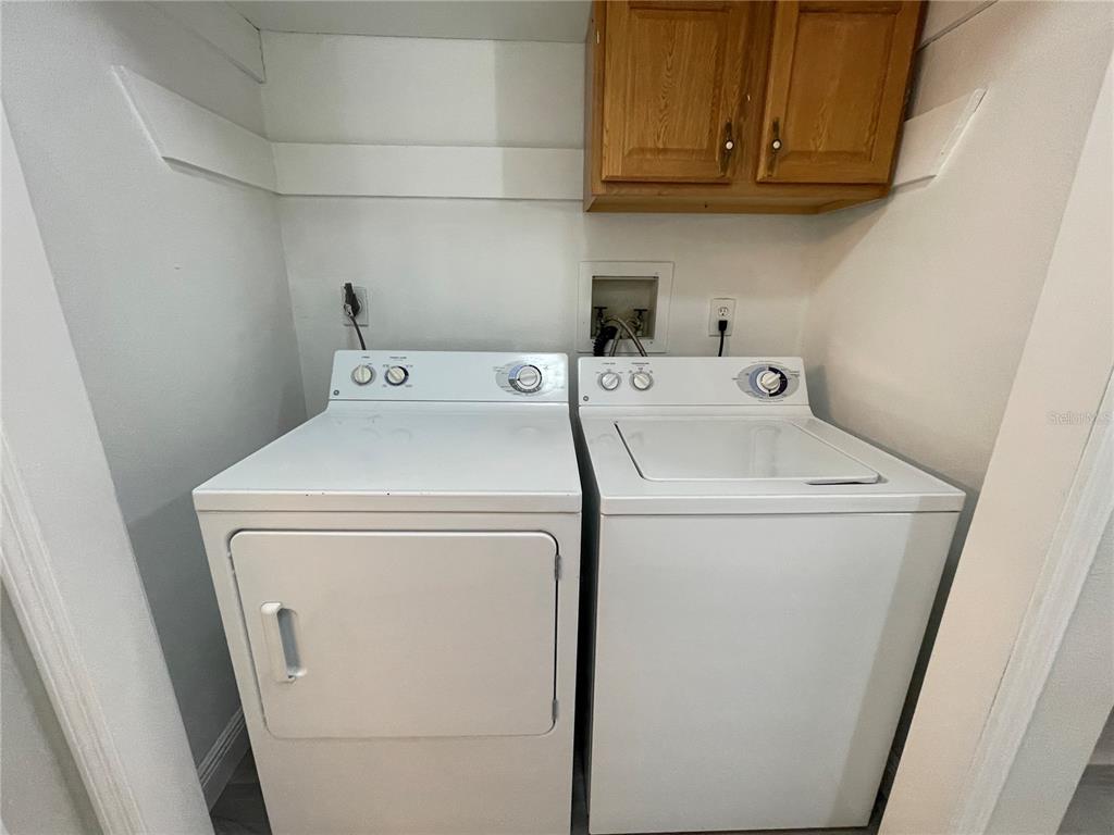 1600 Big Tree Road, Unit H3 South Daytona, FL 32119 - Photo 13 of 18 a utility room with dryer and washer