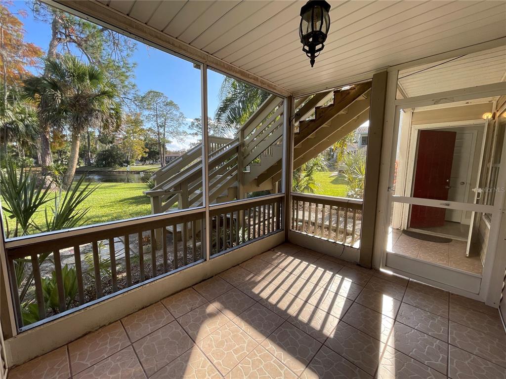 1600 Big Tree Road, Unit H3 South Daytona, FL 32119 - Photo 15 of 18 a view of a balcony with wooden floor