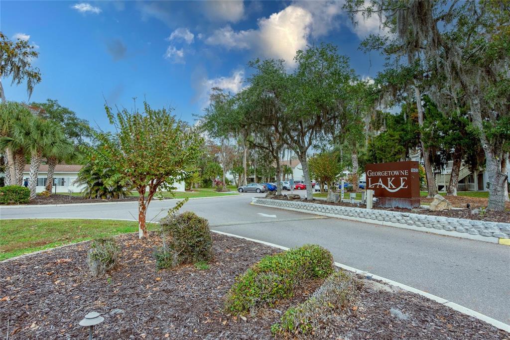 1600 Big Tree Road, Unit H3 South Daytona, FL 32119 - Photo 3 of 18 a view of a street with a building in the background