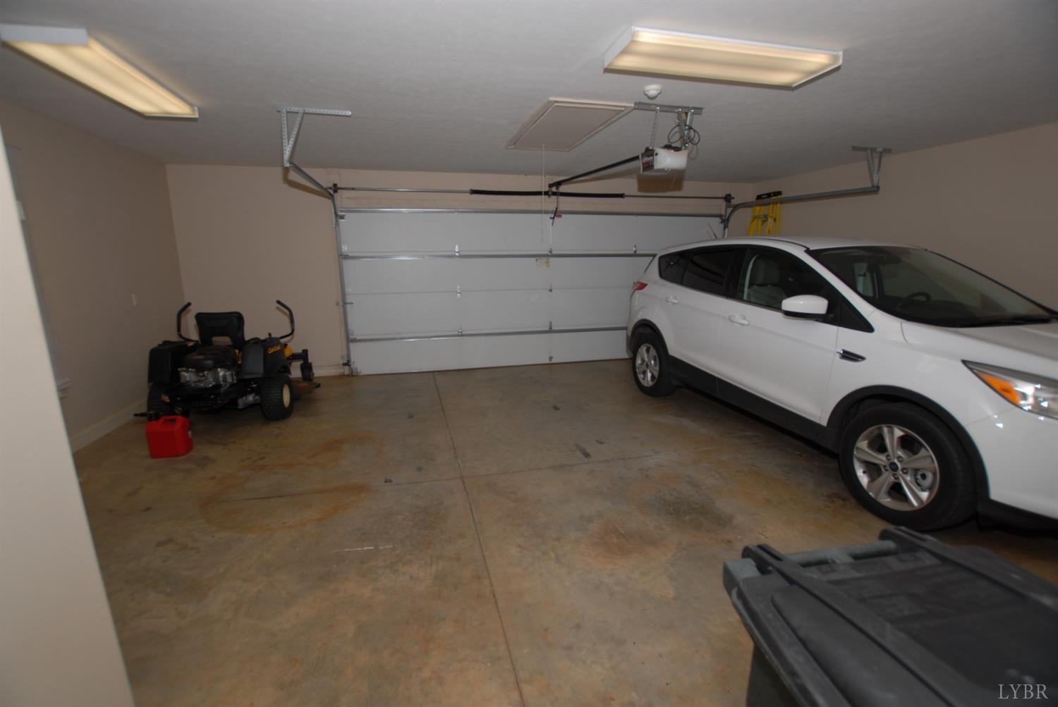 1669 Matthew Talbot Road Forest, VA 24551 - Photo 31 of 56 a car parked in a garage