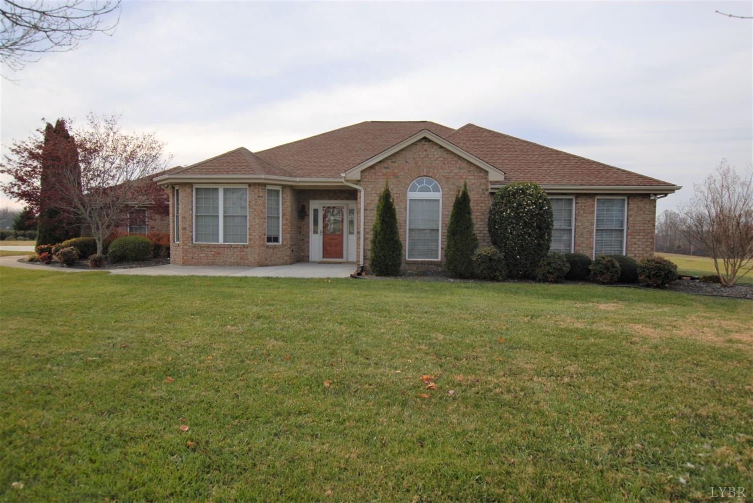 1669 Matthew Talbot Road Forest, VA 24551 - Photo 50 of 56 a front view of a house with a garden