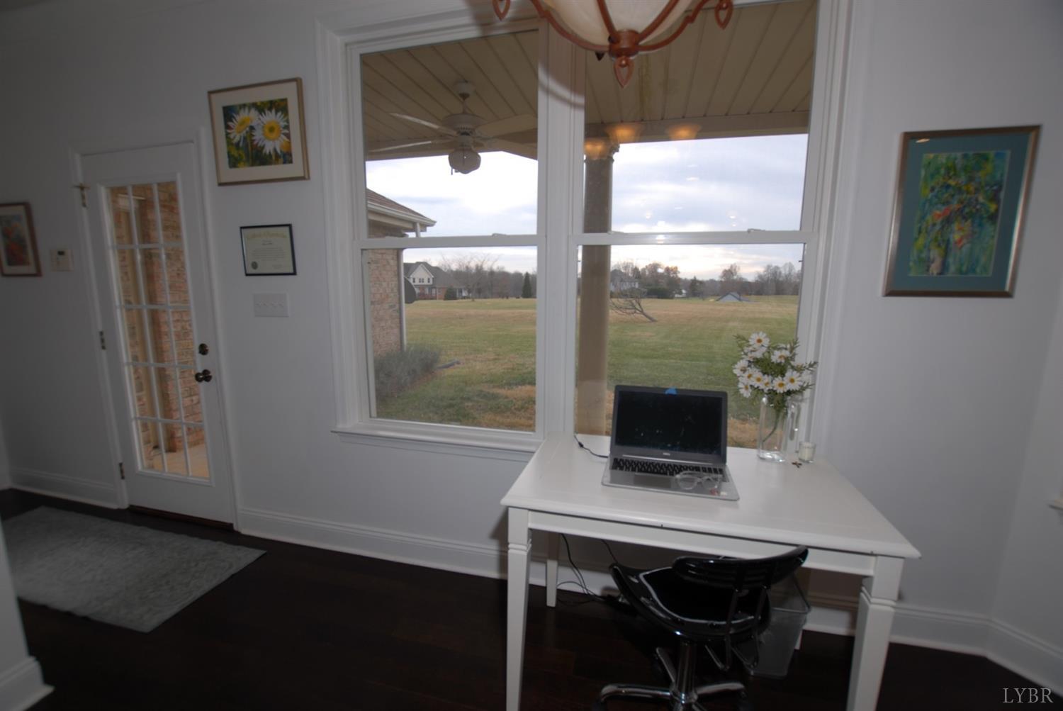 1669 Matthew Talbot Road Forest, VA 24551 - Photo 10 of 56 a workspace with furniture and window