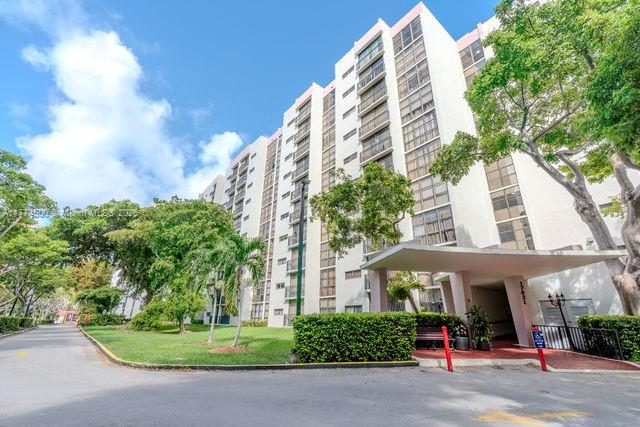 17021 North Bay Road, Unit 414 Sunny Isles Beach, FL 33160 - Photo 1 of 28 a front view of a building