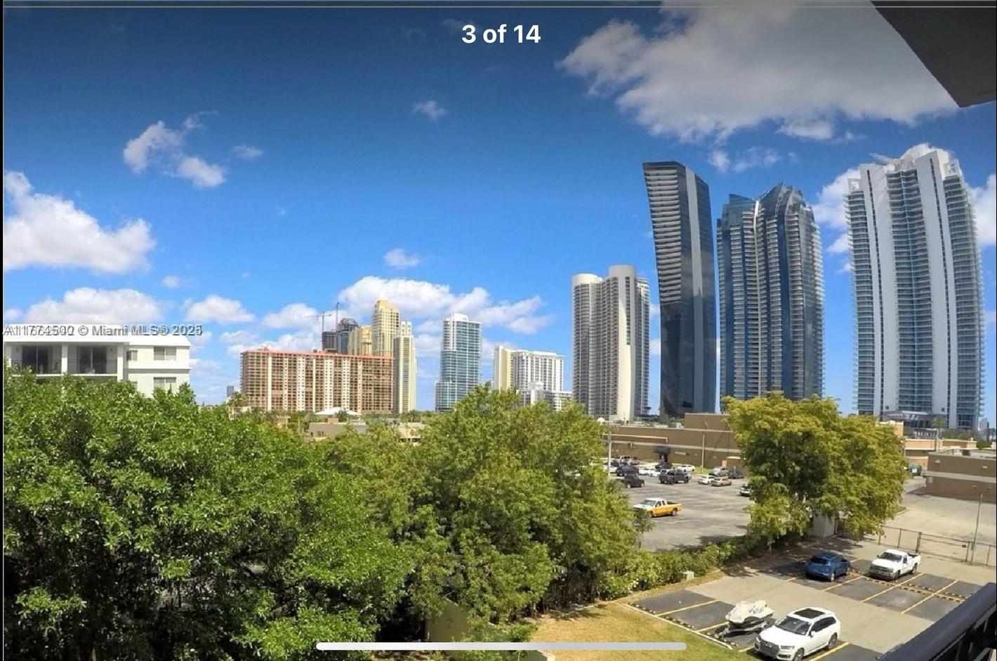 17021 North Bay Road, Unit 414 Sunny Isles Beach, FL 33160 - Photo 18 of 28 a view of a city with tall buildings