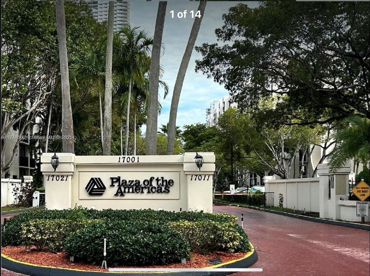 17021 North Bay Road, Unit 414 Sunny Isles Beach, FL 33160 - Photo 2 of 28 a view of outdoor space with signage and flags