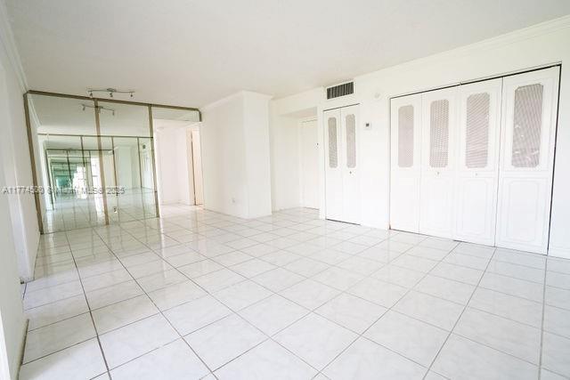 17021 North Bay Road, Unit 414 Sunny Isles Beach, FL 33160 - Photo 4 of 28 a view of an empty room and window