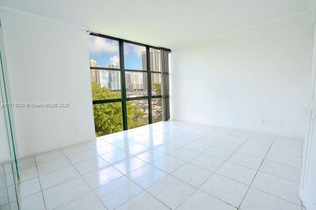 17021 North Bay Road, Unit 414 Sunny Isles Beach, FL 33160 - Photo 6 of 28 a view of an empty room with a window