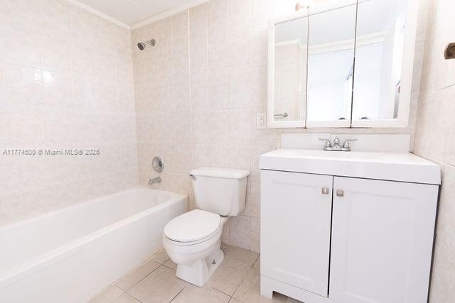 17021 North Bay Road, Unit 414 Sunny Isles Beach, FL 33160 - Photo 8 of 28 a bathroom with a sink toilet and shower