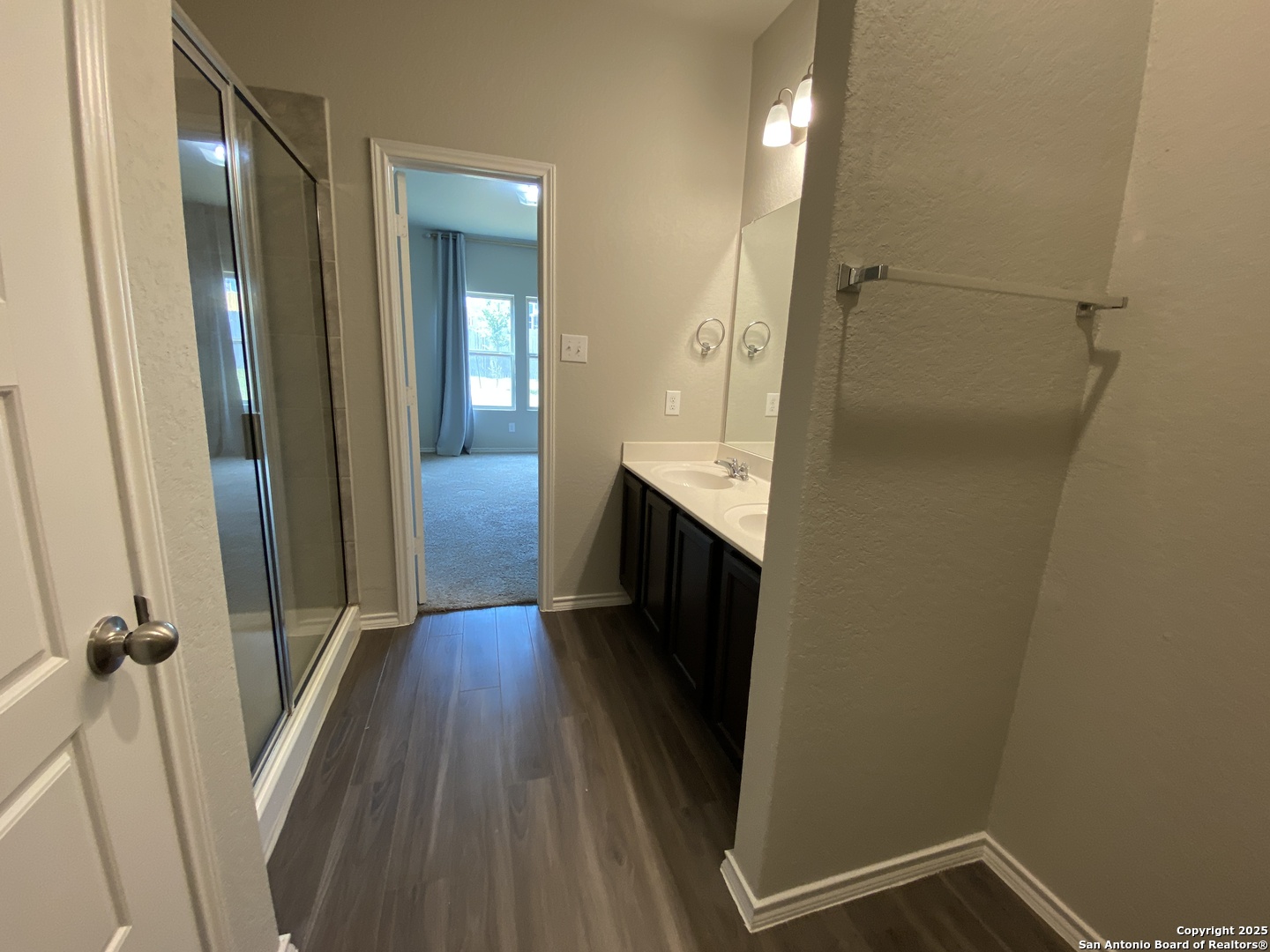 10822 Randolph Way Converse, TX 78109 - Photo 13 of 33 a view of hallway with wooden floor