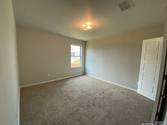a bathroom with a sink a shower and a mirror