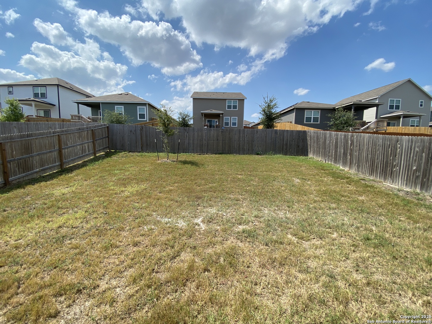 10822 Randolph Way Converse, TX 78109 - Photo 31 of 33 a view of yard and front view of house
