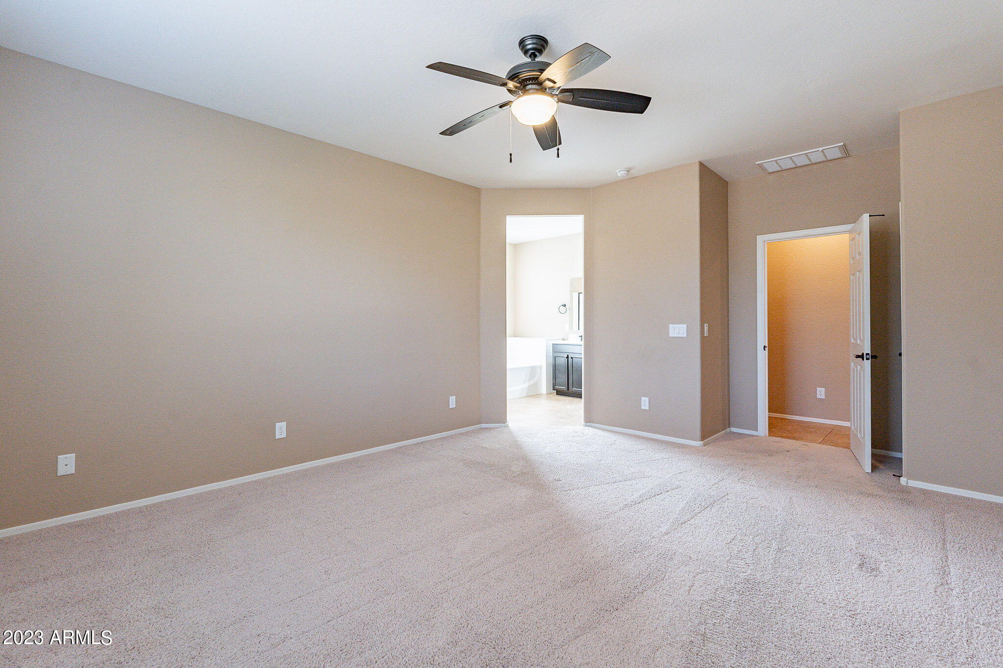 15948 West Berkeley Road Goodyear, AZ 85395 - Photo 24 of 66 23 downstairs primary bedroom-Berkeley