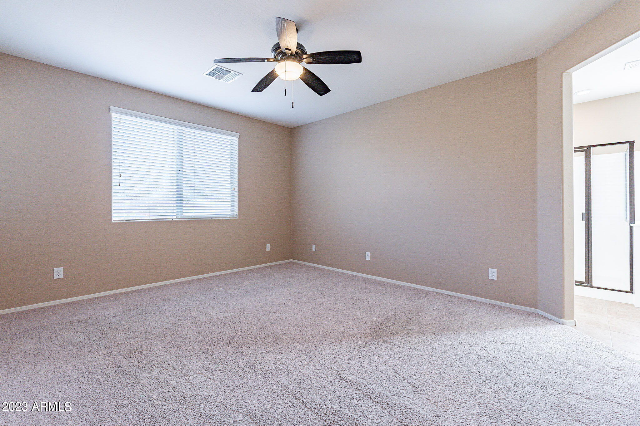 15948 West Berkeley Road Goodyear, AZ 85395 - Photo 25 of 66 24 downstairs primary bedroom-Berkeley