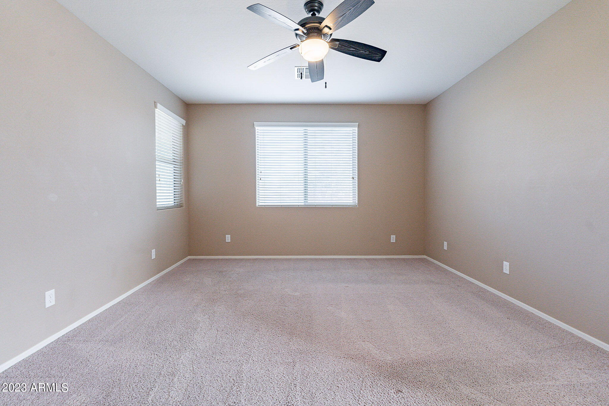 15948 West Berkeley Road Goodyear, AZ 85395 - Photo 27 of 66 26 downstairs primary bedroom-Berkeley