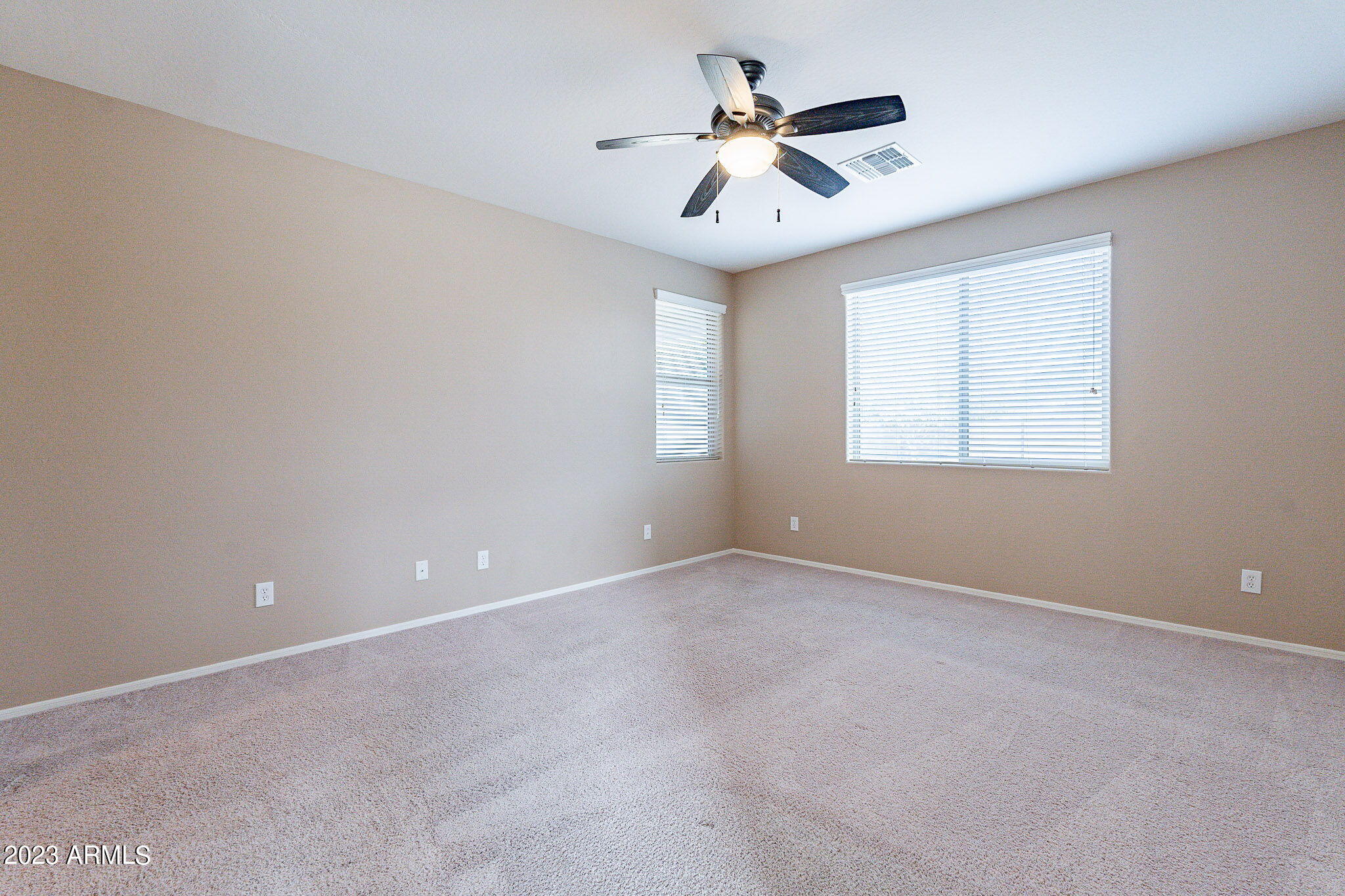 15948 West Berkeley Road Goodyear, AZ 85395 - Photo 28 of 66 27 downstairs primary bedroom-Berkeley