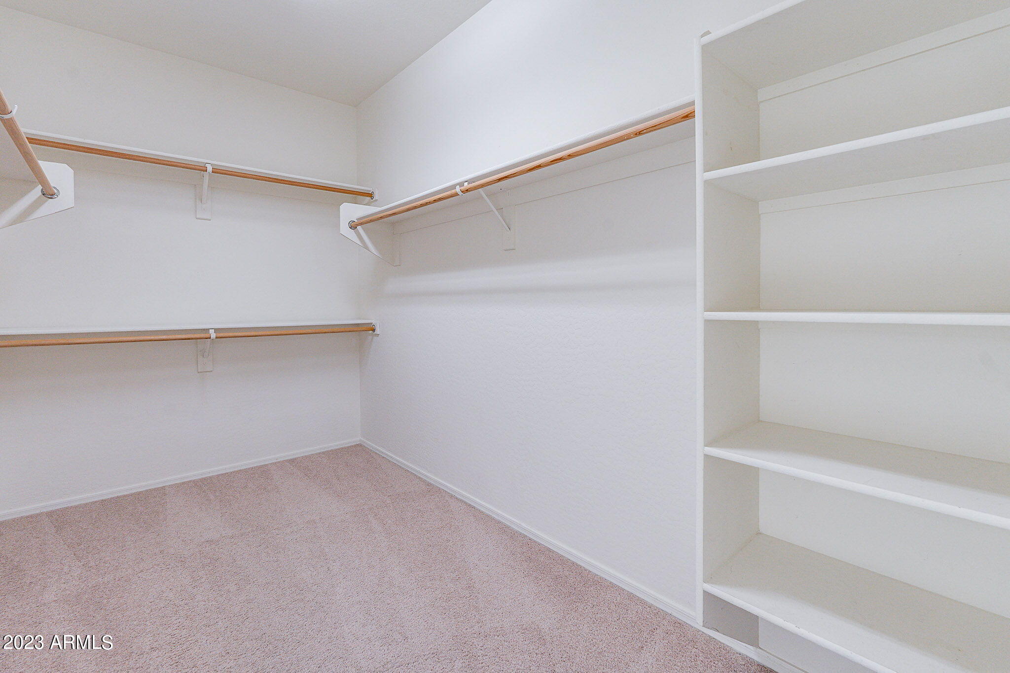 15948 West Berkeley Road Goodyear, AZ 85395 - Photo 32 of 66 31 downstairs primary closet-Berkeley