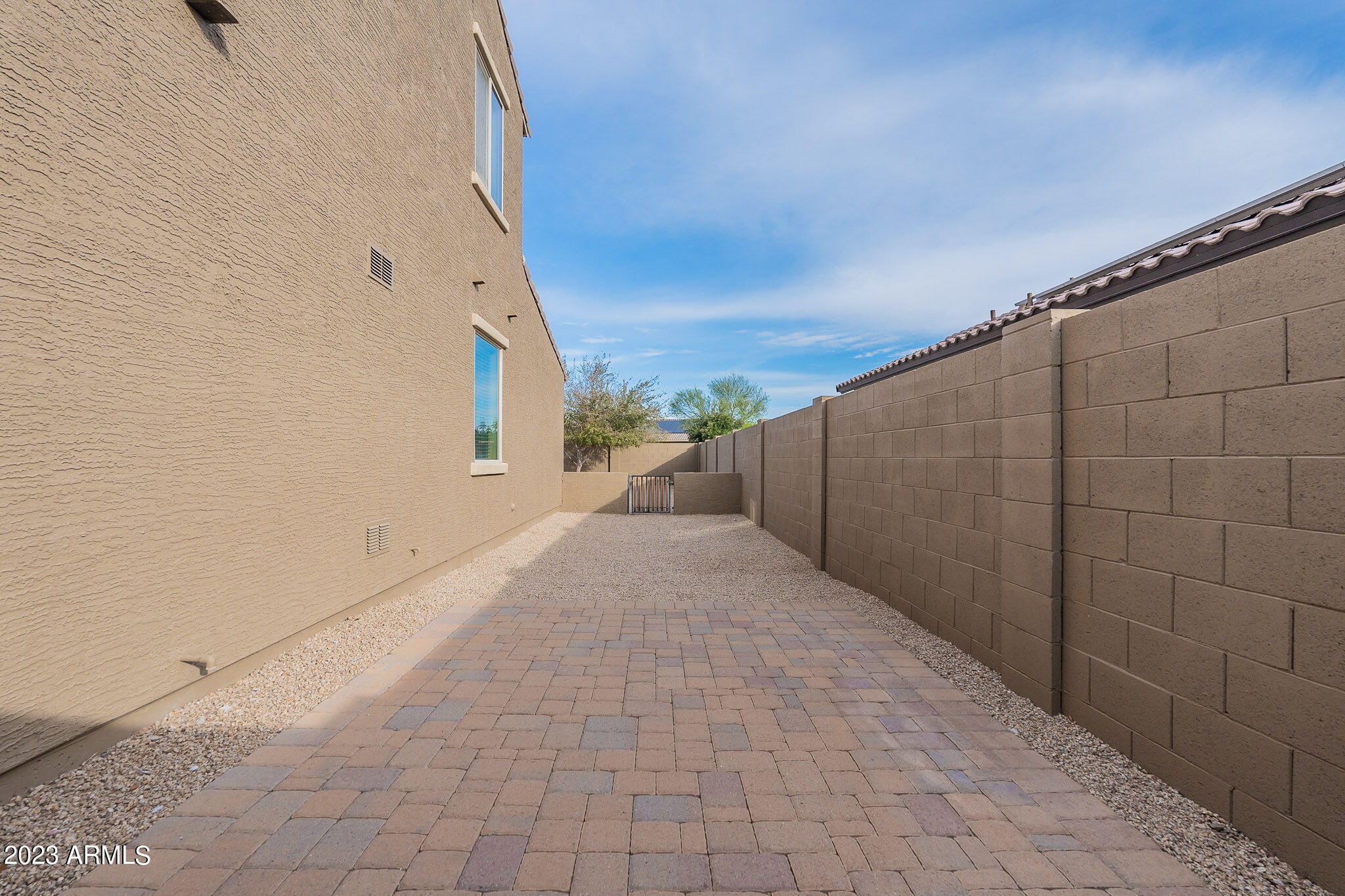 15948 West Berkeley Road Goodyear, AZ 85395 - Photo 60 of 66 59 Paved sideyard-Berkeley