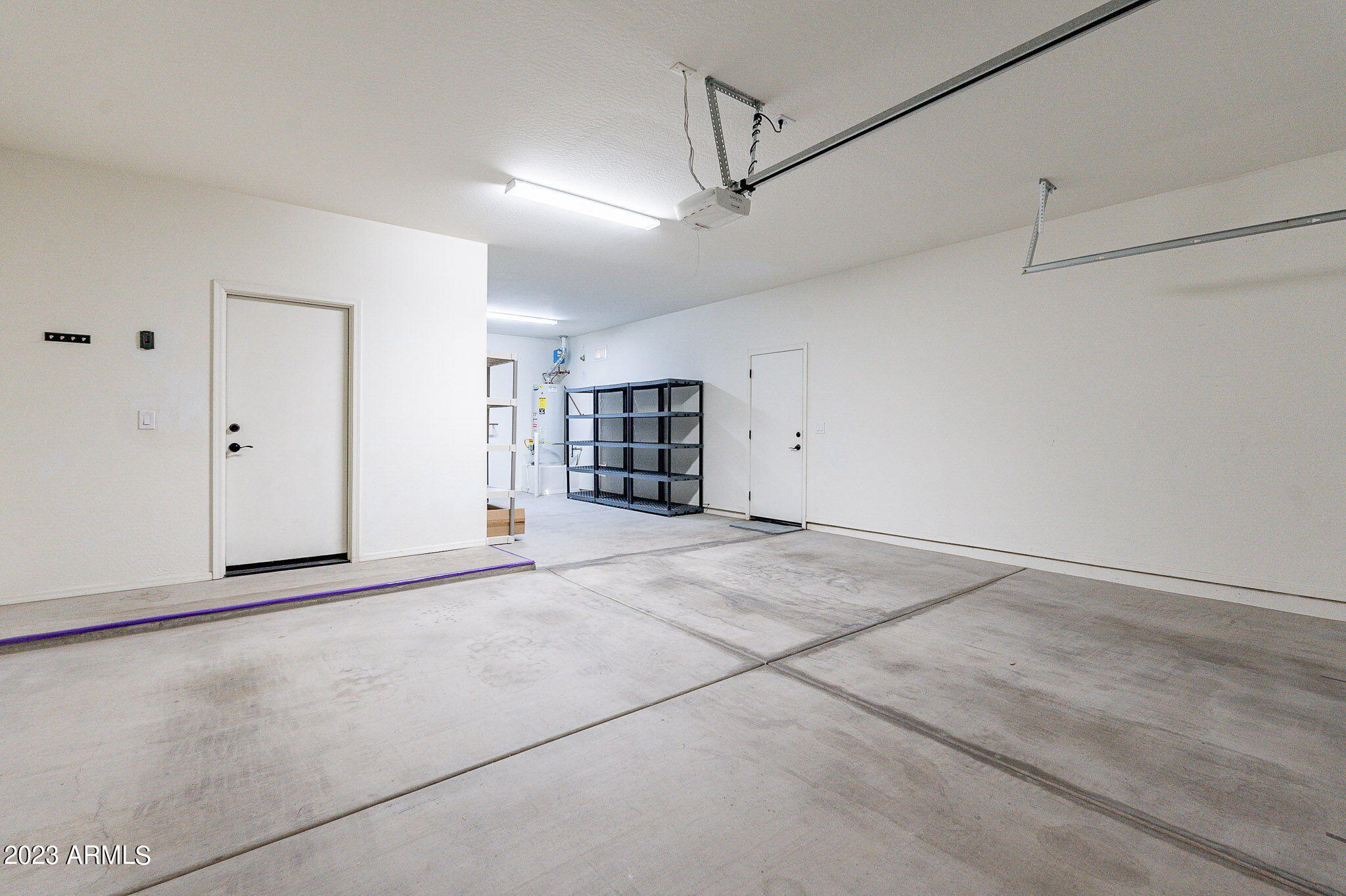 15948 West Berkeley Road Goodyear, AZ 85395 - Photo 61 of 66 60 Tandem 3 car garage-Berkeley