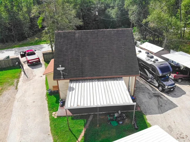 a view of a lake with a yard