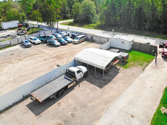 an aerial view of a house with a garden