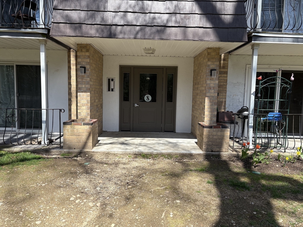 a view of a entryway door front of house