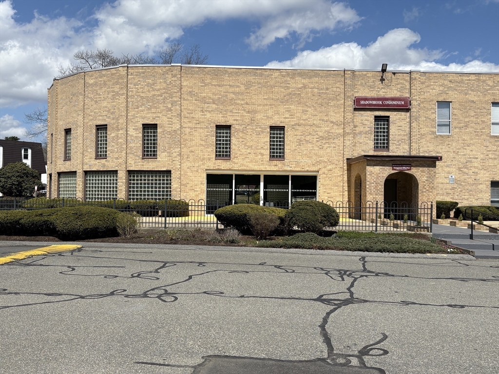 8 Shadowbrook Lane, Unit 14 Milford, MA 01757 - Photo 19 of 19 a front view of a building