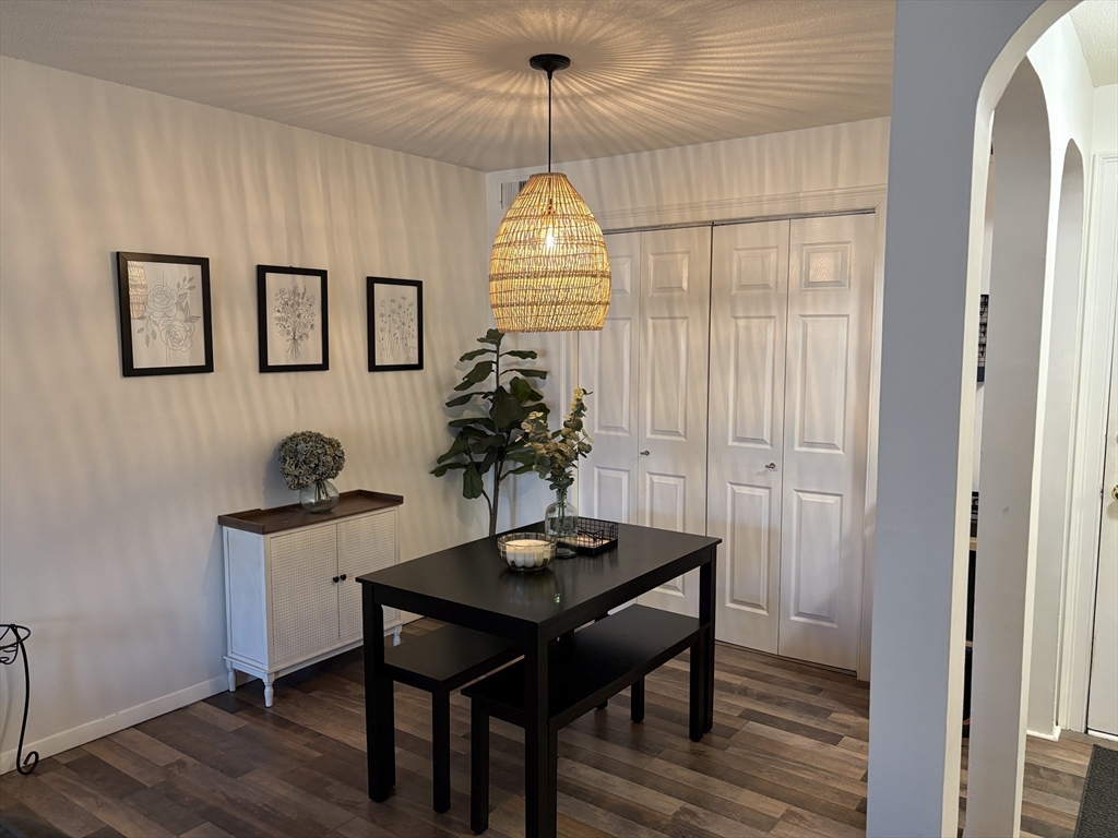 8 Shadowbrook Lane, Unit 14 Milford, MA 01757 - Photo 3 of 19 a workspace with furniture and window