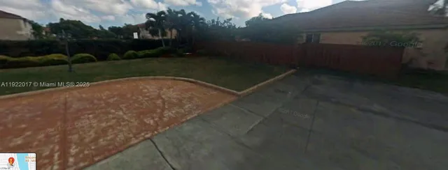 a view of outdoor space and yard